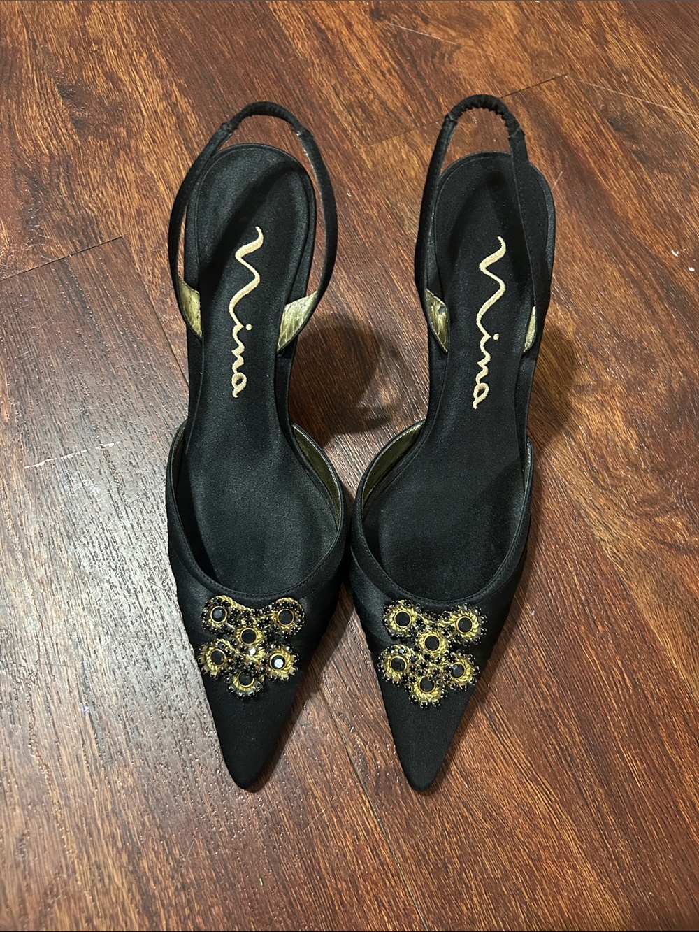 Nina Black Pointed Slingback Pumps with Gold Floral Embellishments